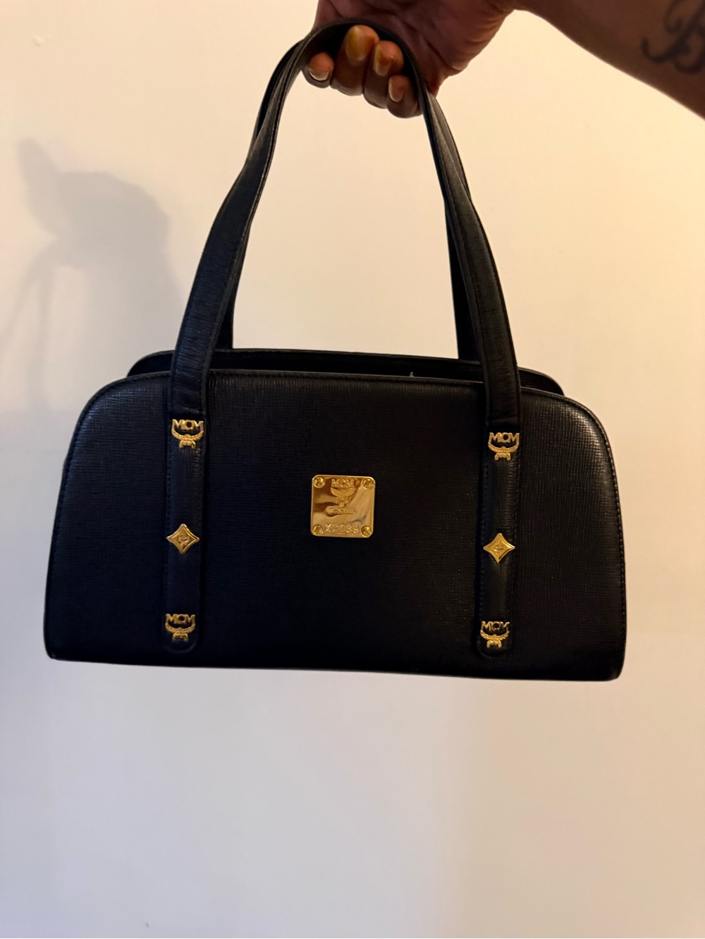 MCM Black Leather Satchel with Gold Logo Plaque